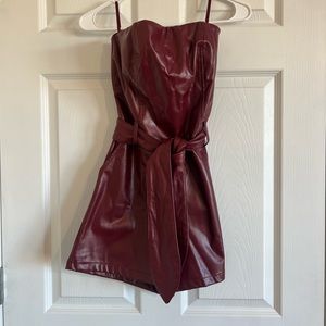 Red leather romper from These Three Boutique!